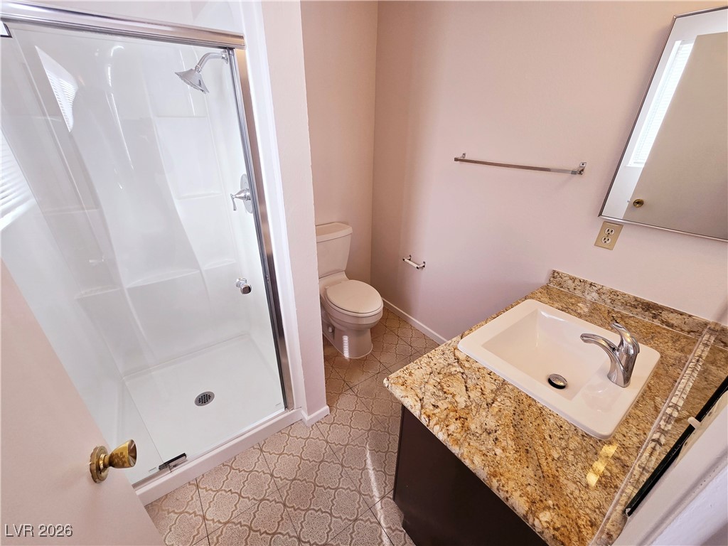 1108 Meadbrook Street Las Vegas, NV 89110 - Photo 20 of 41 Full bathroom with vanity and a stall shower
