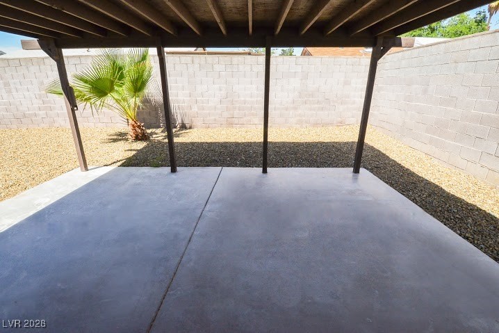 1108 Meadbrook Street Las Vegas, NV 89110 - Photo 33 of 41 Fenced backyard with a patio area