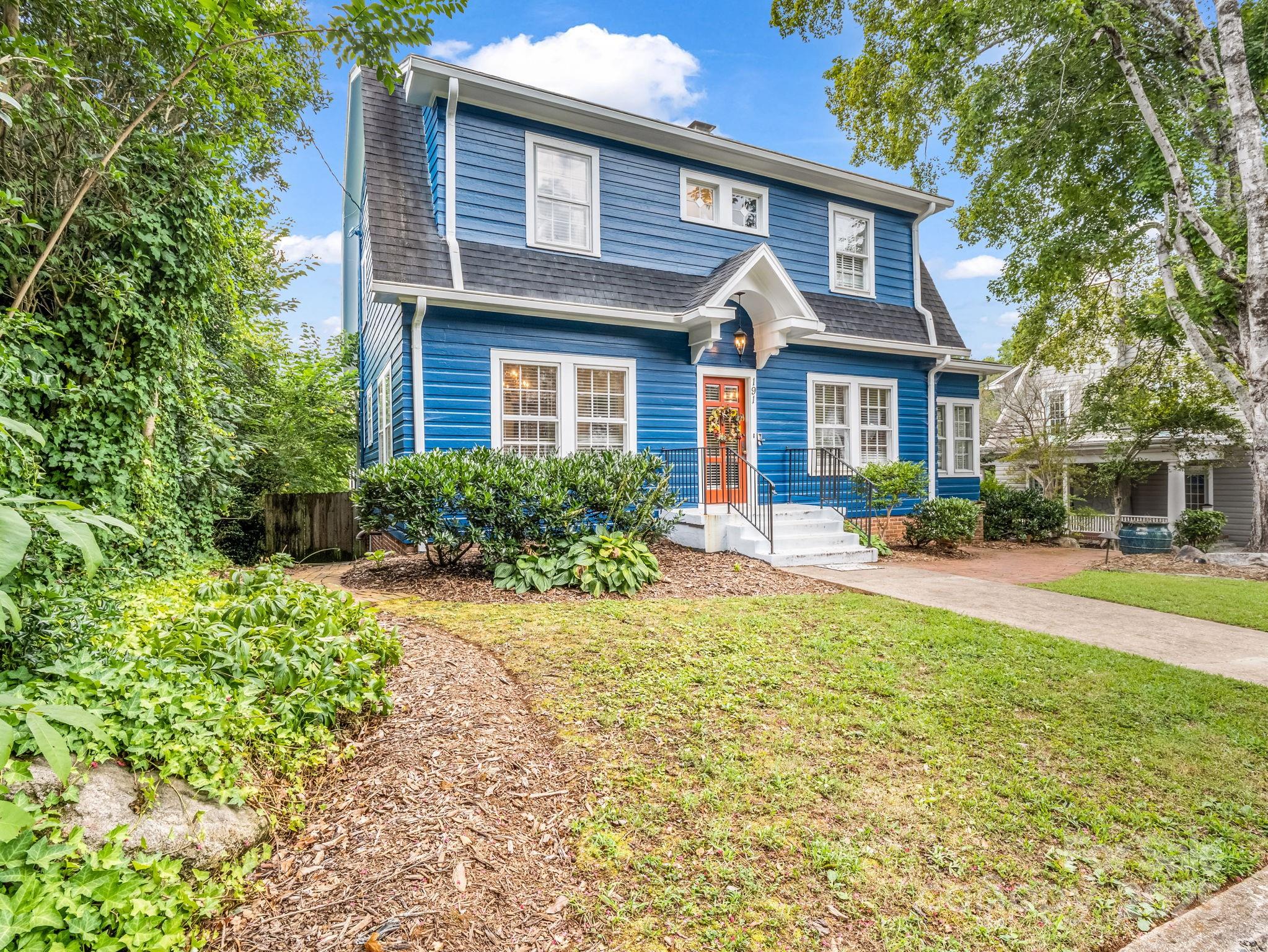 191 West 6th Street Rutherfordton, NC 28139 - Photo 2 of 38 a front view of a house with garden