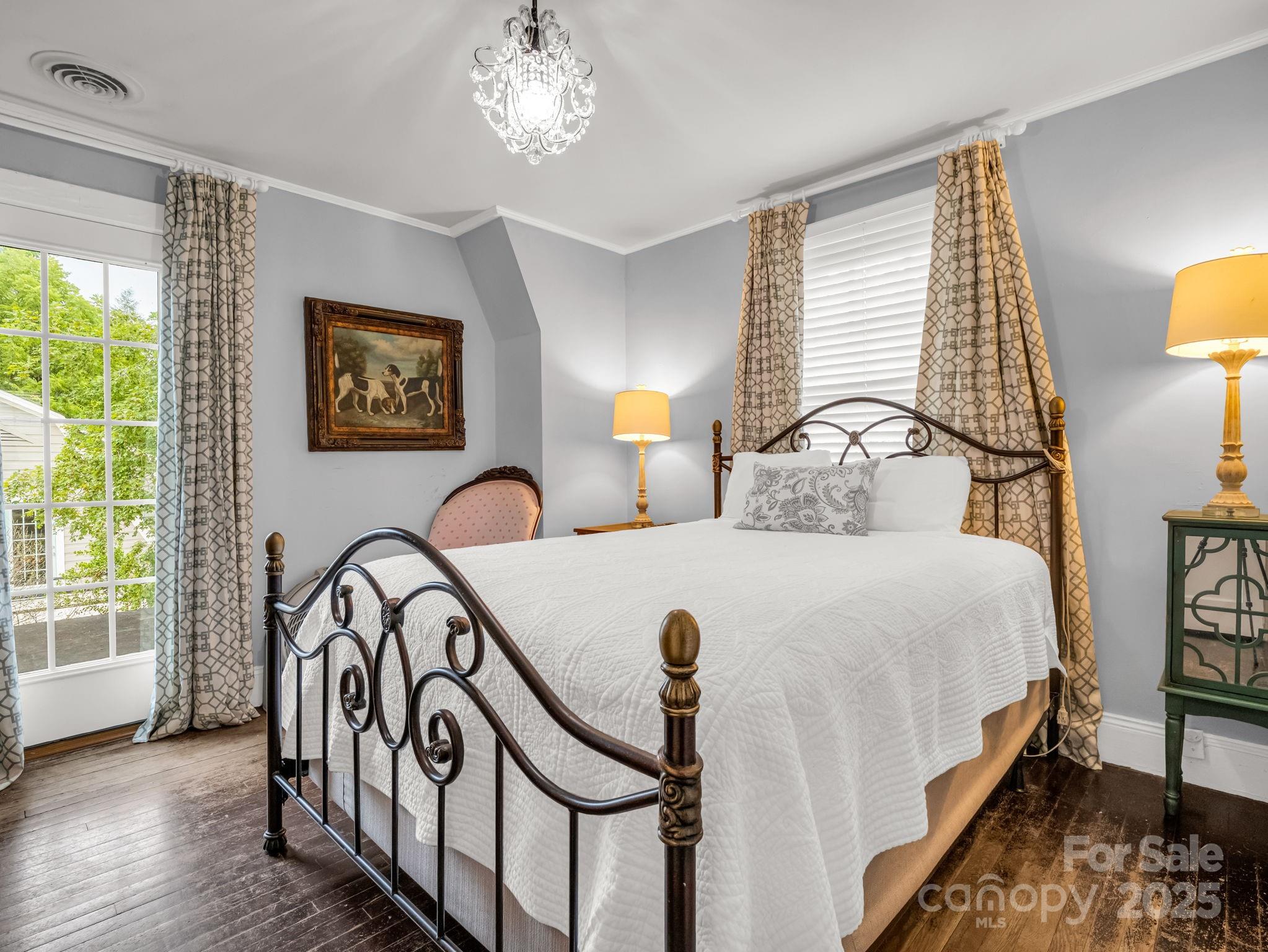 191 West 6th Street Rutherfordton, NC 28139 - Photo 22 of 38 a bedroom with bed and a window