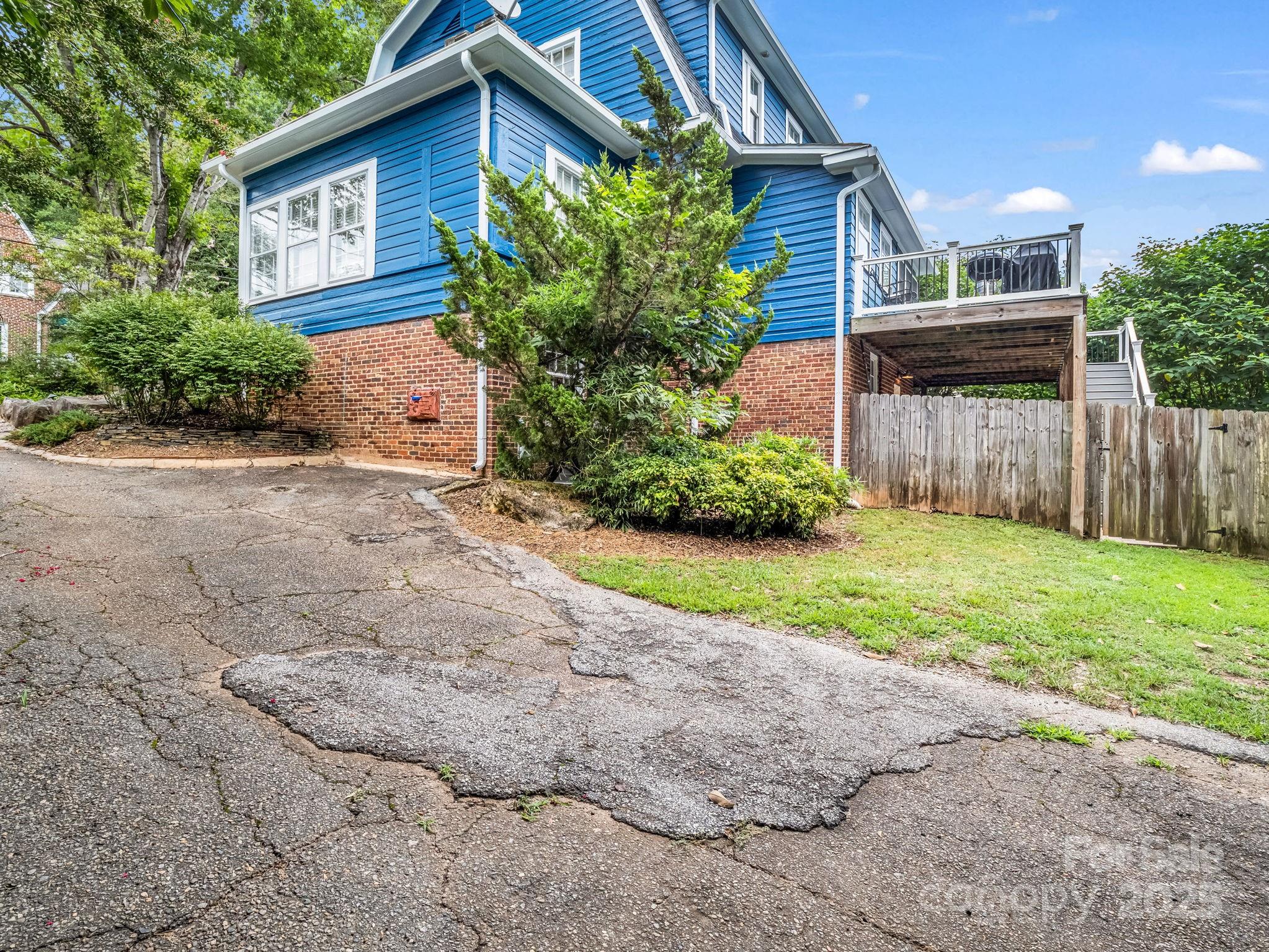 191 West 6th Street Rutherfordton, NC 28139 - Photo 28 of 38 a front view of a house with garden