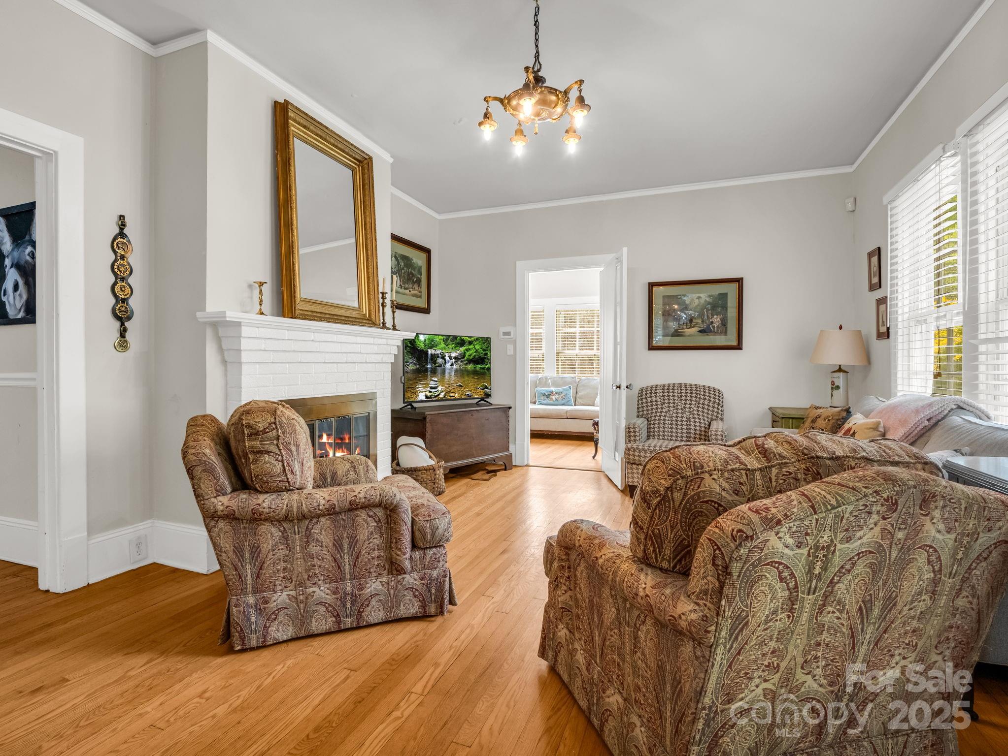 191 West 6th Street Rutherfordton, NC 28139 - Photo 3 of 38 a living room with furniture fireplace and a window