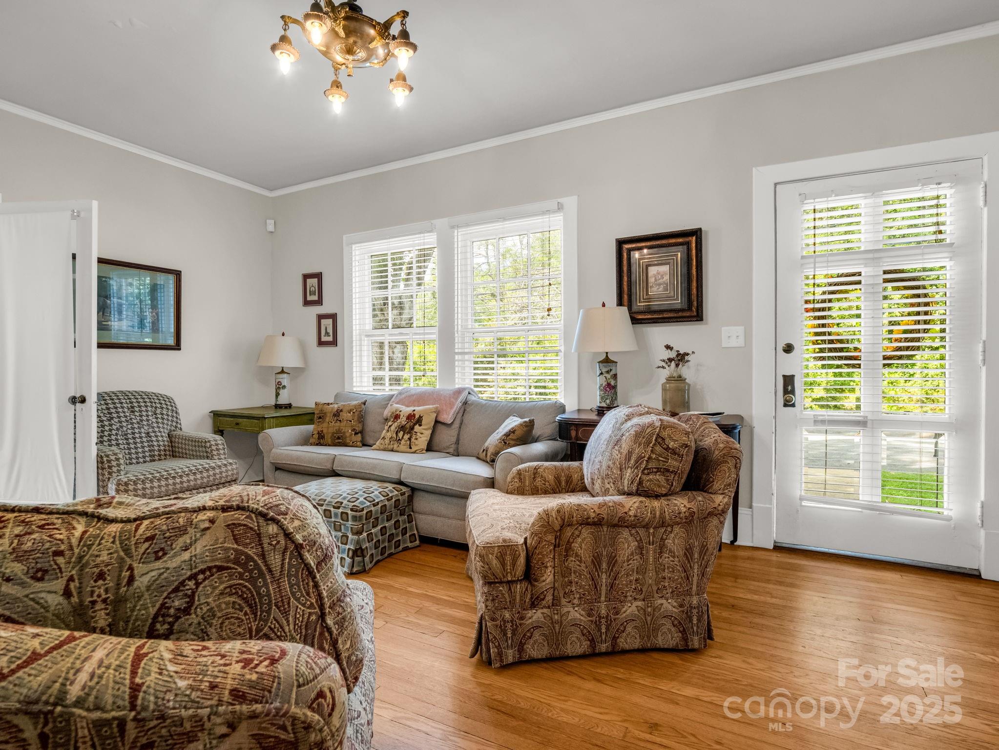 191 West 6th Street Rutherfordton, NC 28139 - Photo 5 of 38 a living room with furniture and a flat screen tv