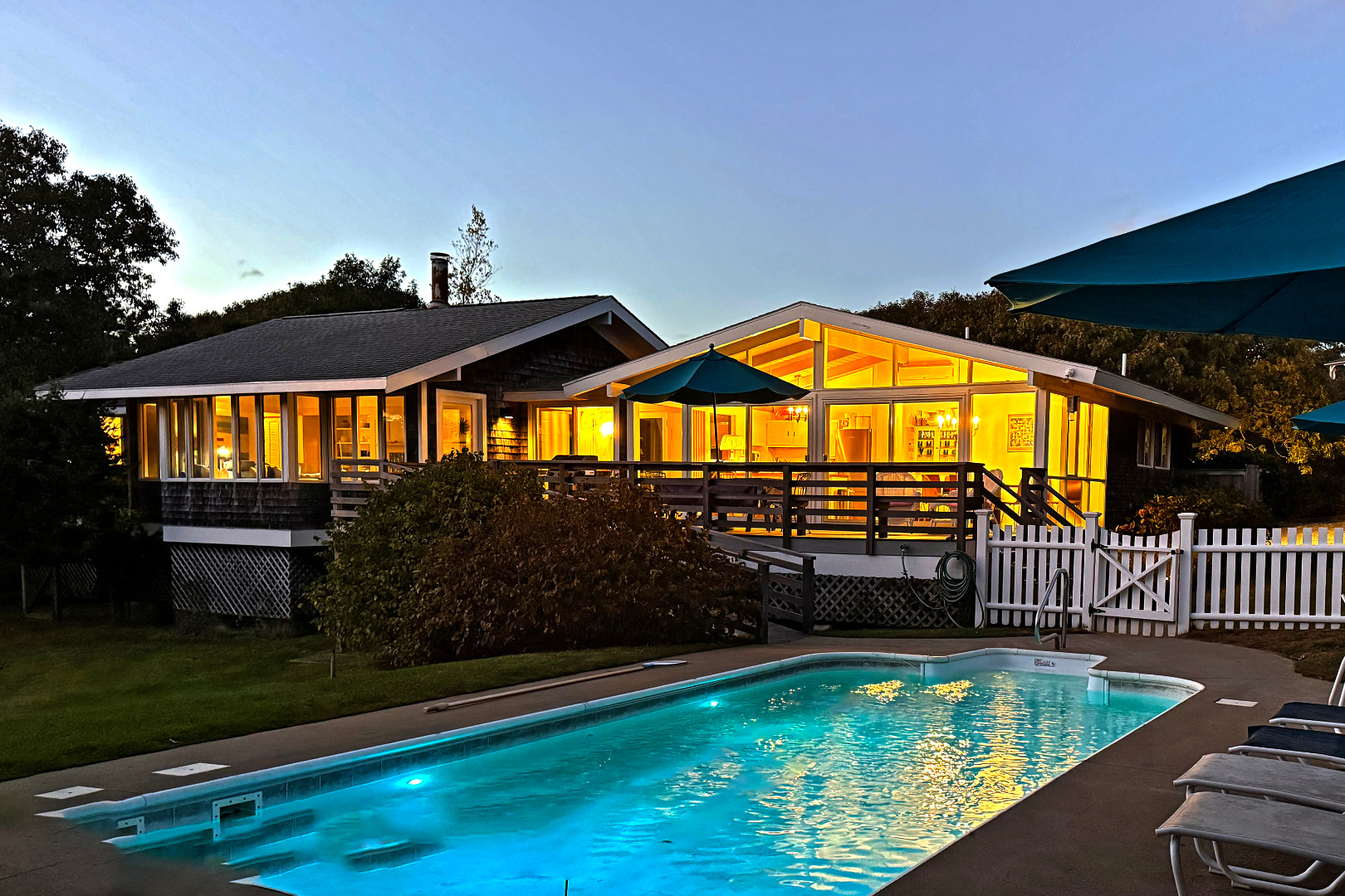 a view of swimming pool with an outdoor seating