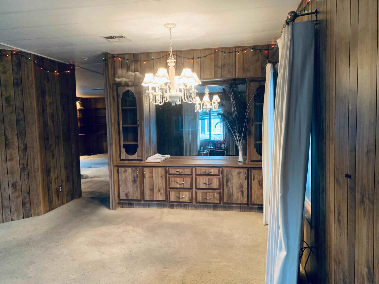 3901 Lake Road, Unit 72 West Sacramento, CA 95691 - Photo 20 of 53 a view of a hallway with chandelier and entryway