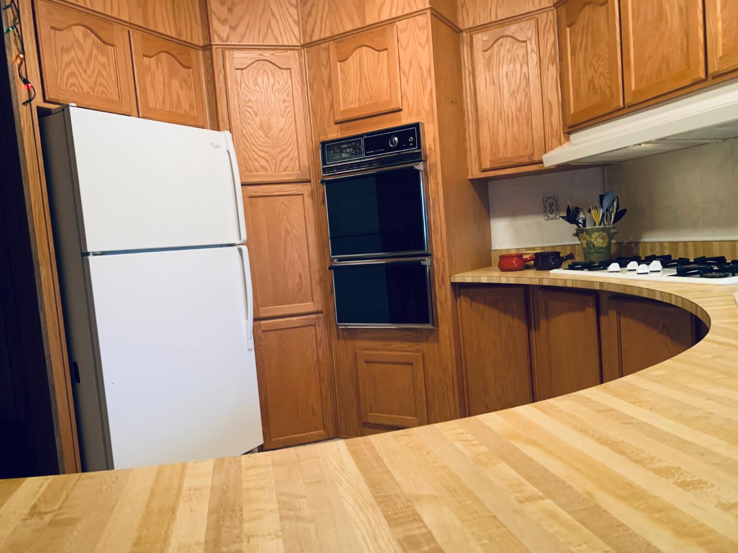 3901 Lake Road, Unit 72 West Sacramento, CA 95691 - Photo 24 of 53 a kitchen with stainless steel appliances a refrigerator and a sink