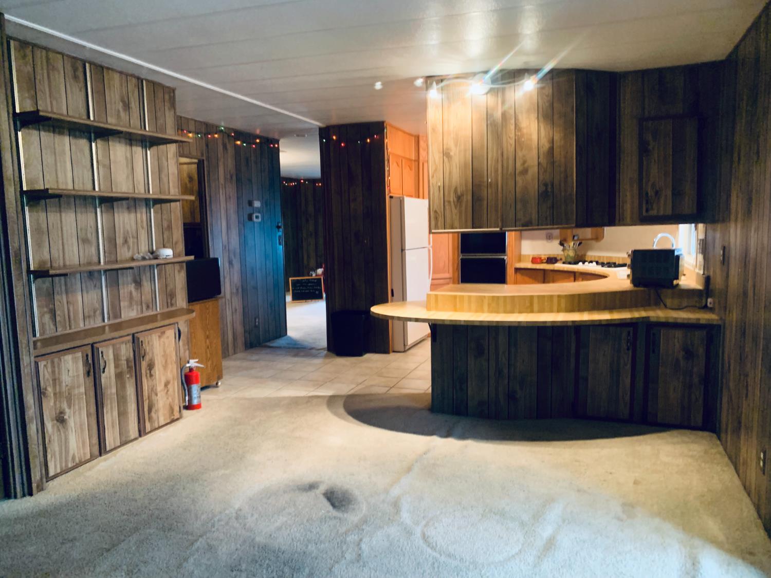 3901 Lake Road, Unit 72 West Sacramento, CA 95691 - Photo 32 of 53 a kitchen with a wooden cabinets and a sink