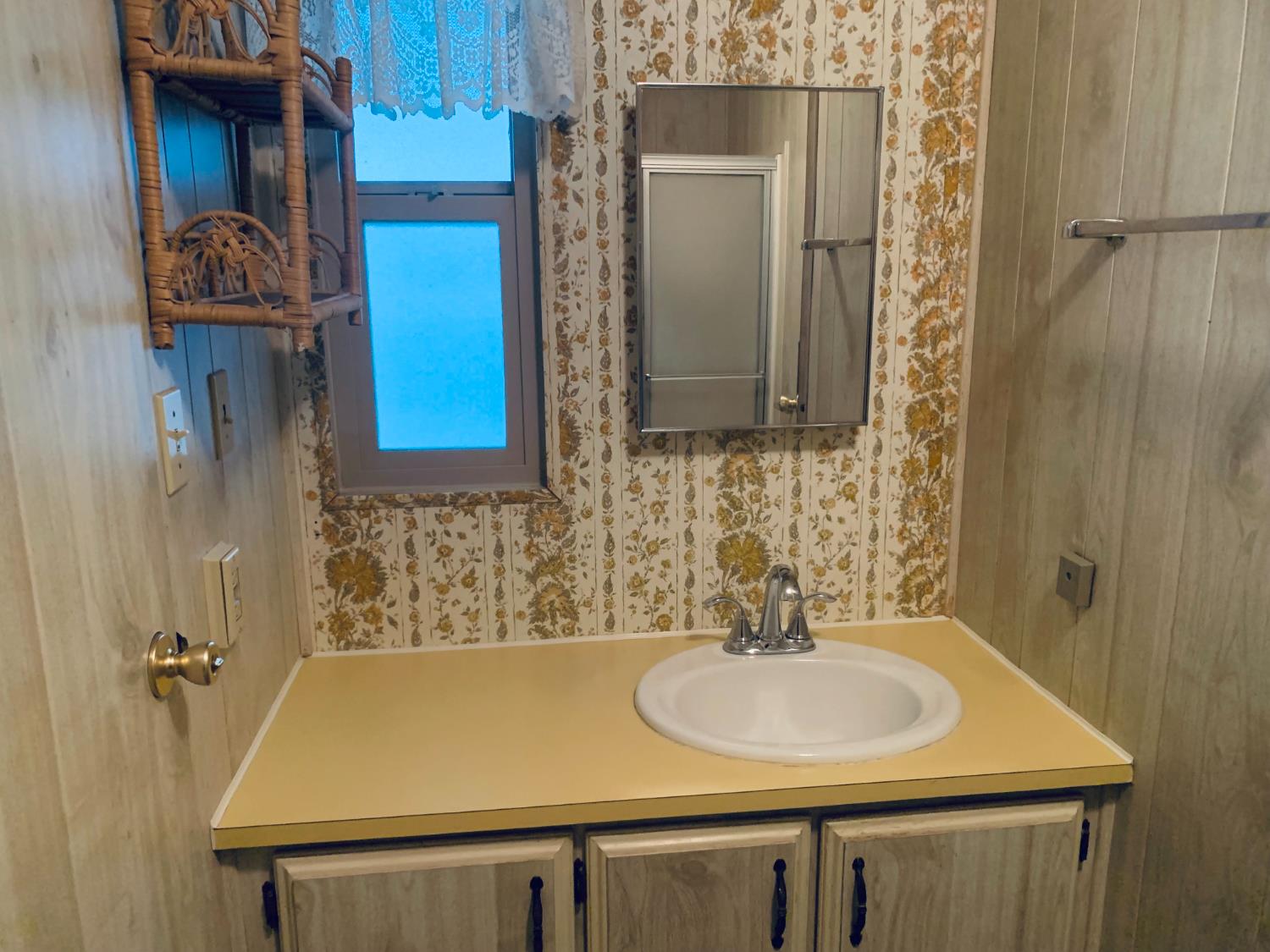 3901 Lake Road, Unit 72 West Sacramento, CA 95691 - Photo 46 of 53 a bathroom with a sink and a mirror