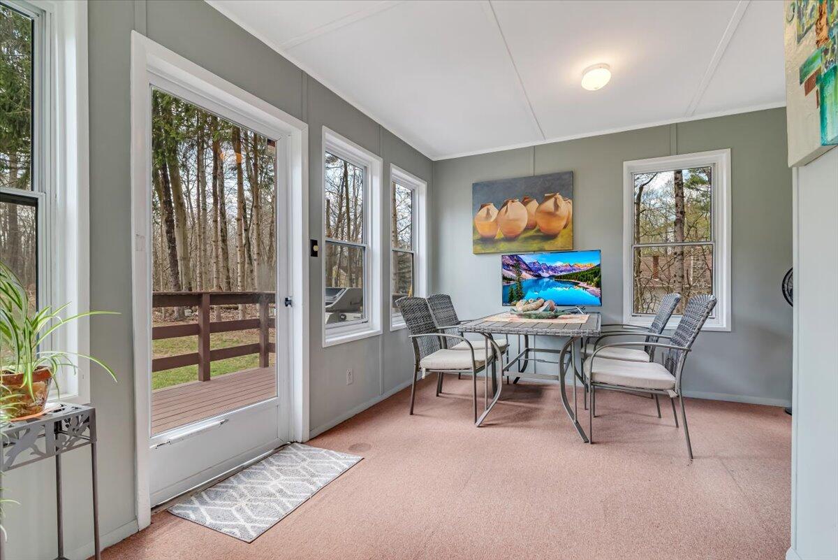 253 Thomas Road Blakeslee, PA 18610 - Photo 11 of 67 Rear enclosed 3 Seasons Room