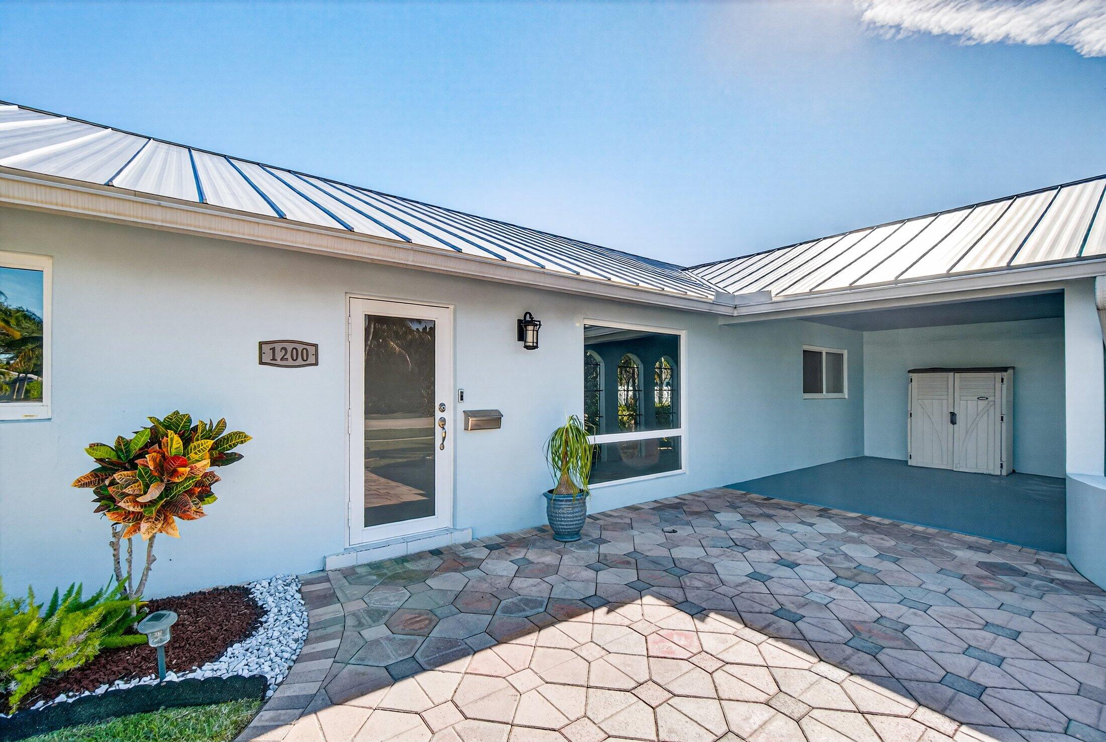 1200 Southwest 12th Terrace Boca Raton, FL 33486 - Photo 3 of 29 Carport