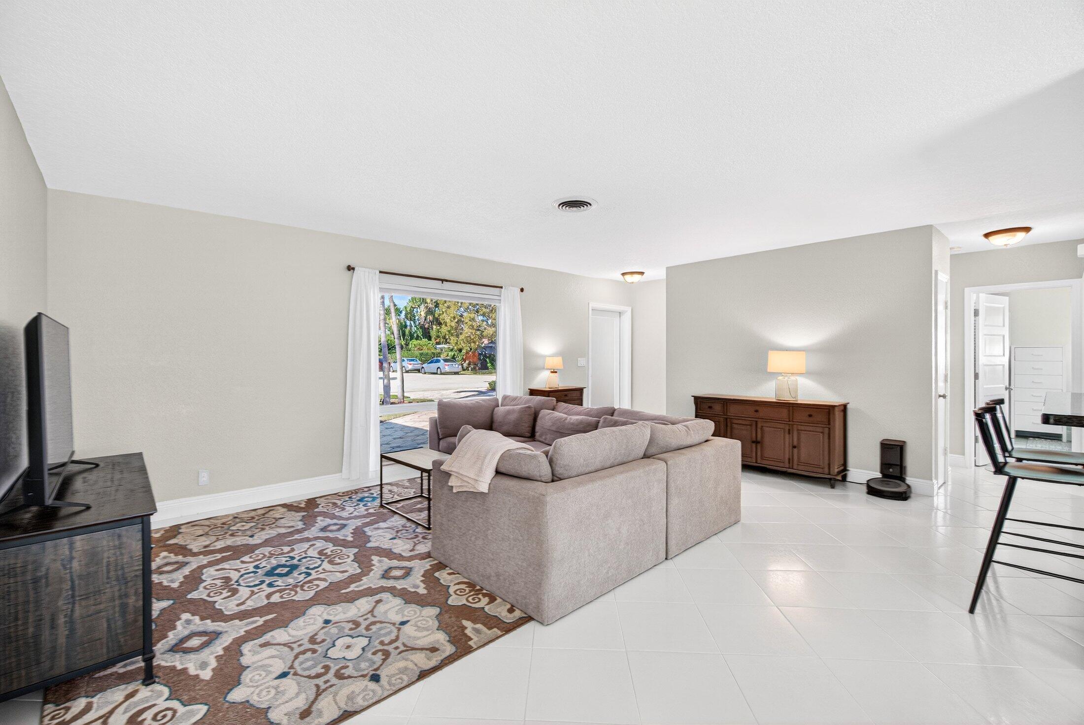 1200 Southwest 12th Terrace Boca Raton, FL 33486 - Photo 6 of 29 LIving room facing entrance.