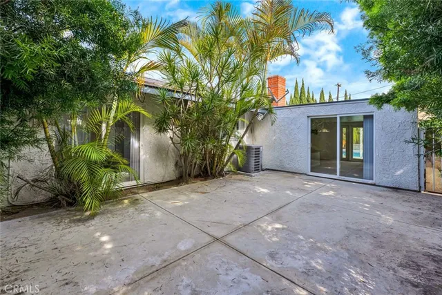 a view of a house with a yard and garage