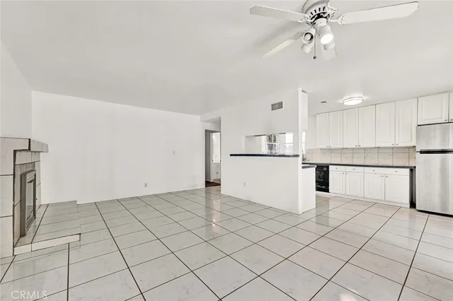 a view of cabinets and window