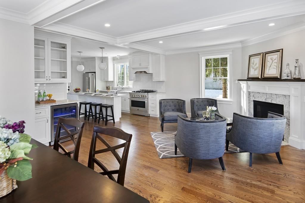 114 Bow Street Lexington, MA 02420 - Photo 13 of 34 a living room with furniture and a fireplace