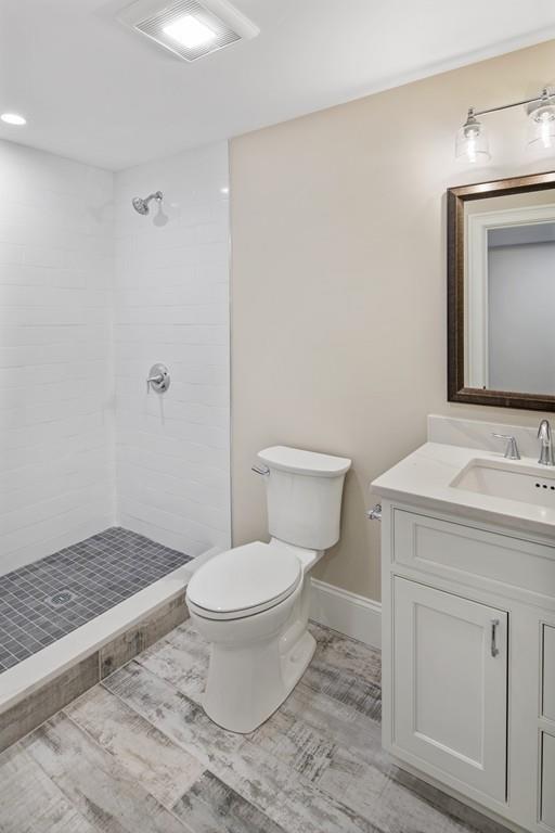 114 Bow Street Lexington, MA 02420 - Photo 17 of 34 a bathroom with a sink toilet and shower