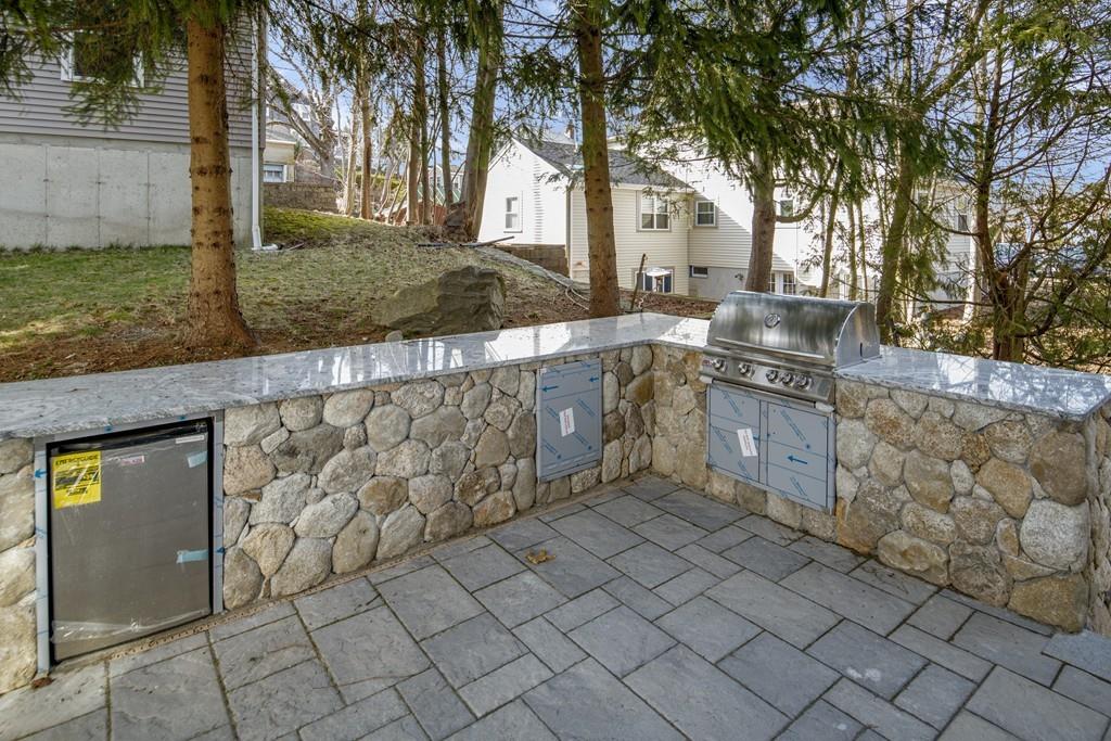 114 Bow Street Lexington, MA 02420 - Photo 32 of 34 a view of a backyard