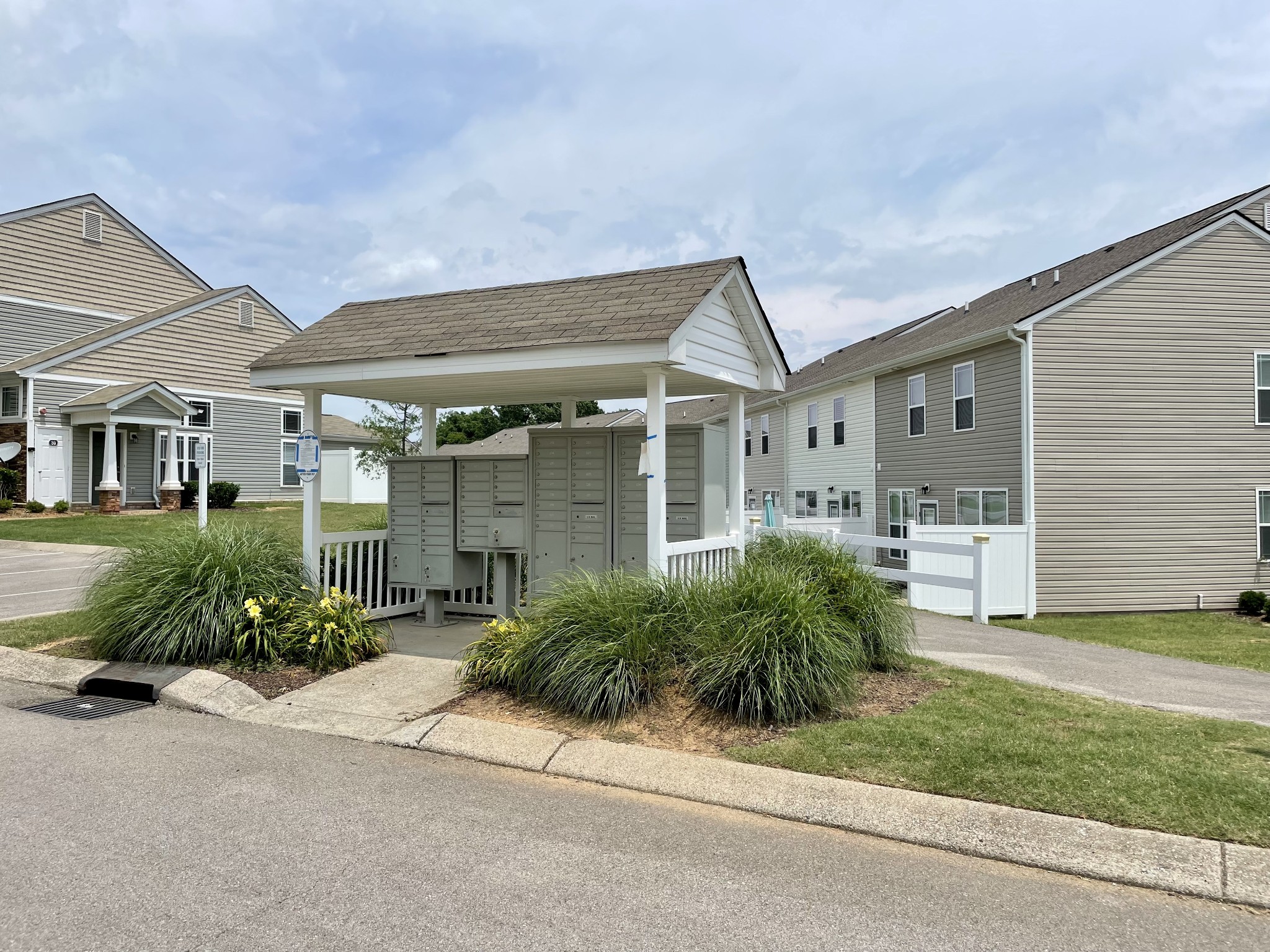 6052 Hillside Lane Spring Hill, TN 37174 - Photo 18 of 23 a front view of a house with garden