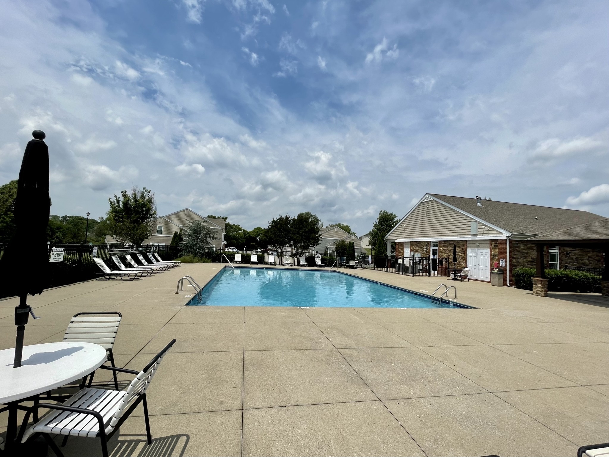 6052 Hillside Lane Spring Hill, TN 37174 - Photo 20 of 23 a view of a patio with swimming pool and furniture