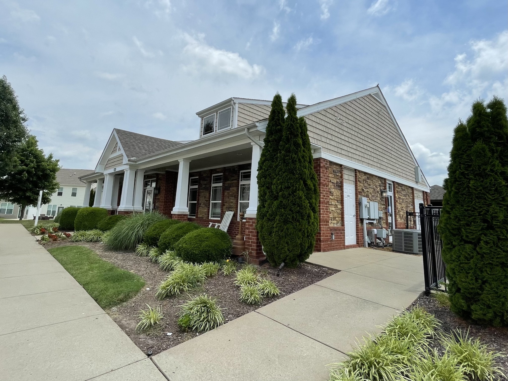 6052 Hillside Lane Spring Hill, TN 37174 - Photo 21 of 23 a front view of a house with garden