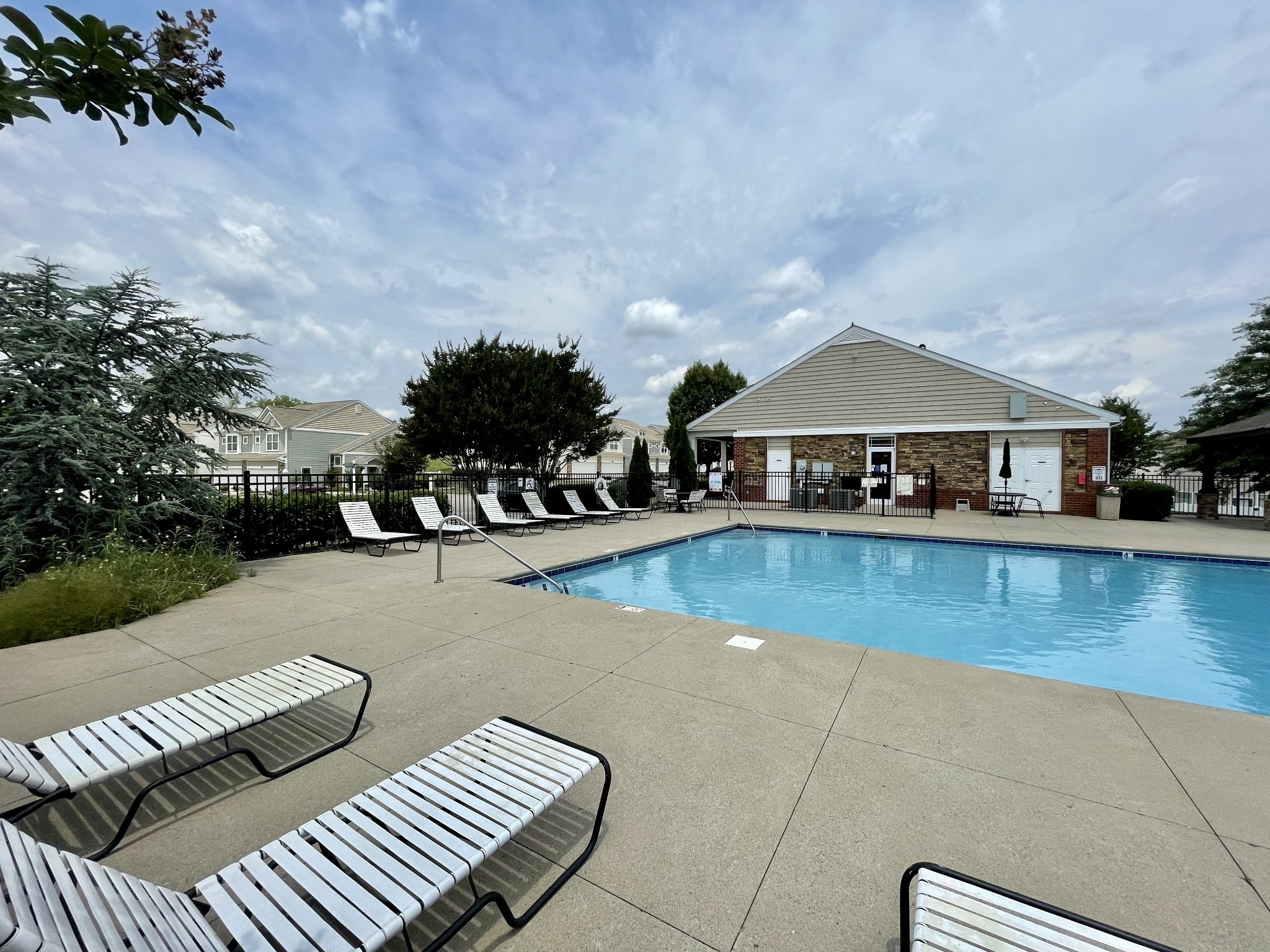 6052 Hillside Lane Spring Hill, TN 37174 - Photo 22 of 23 a view of a house with swimming pool and sitting area