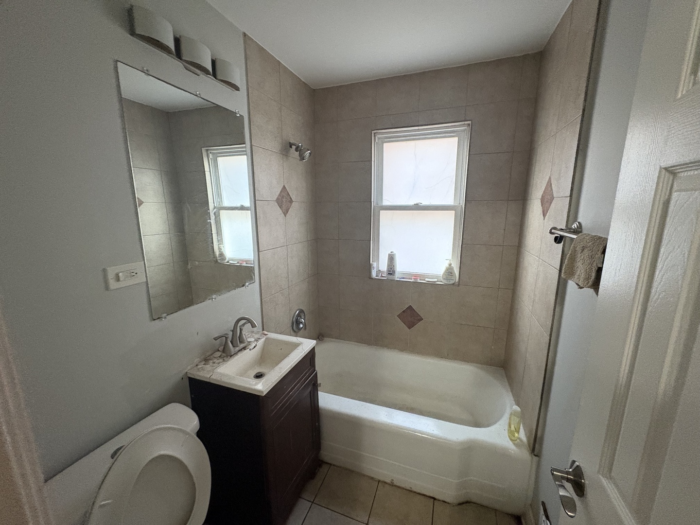 8118 South Spaulding Avenue Chicago, IL 60652 - Photo 7 of 13 a bathroom with a sink toilet and shower