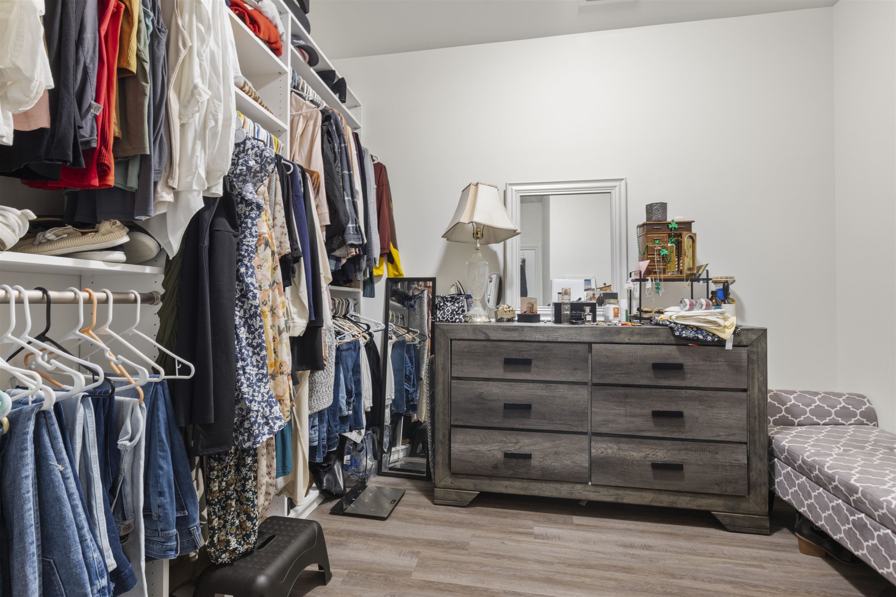 433 Stearn Drive Genoa, IL 60135 - Photo 12 of 24 a view of walk in closet with clothes and shoes