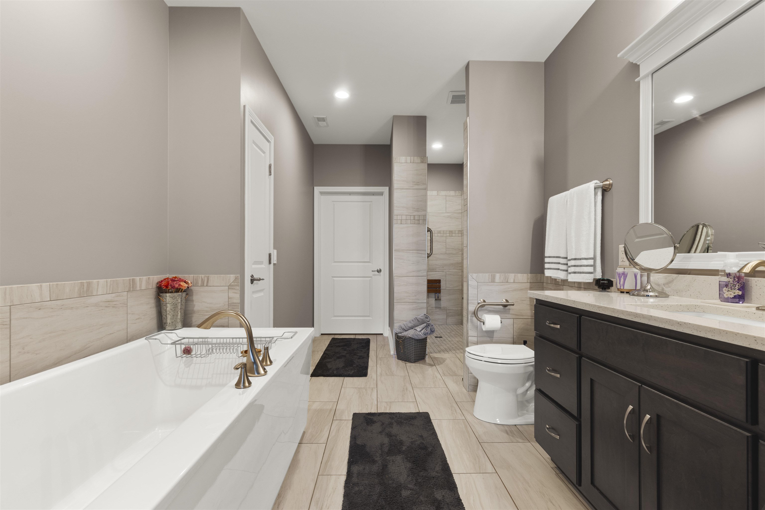 433 Stearn Drive Genoa, IL 60135 - Photo 10 of 24 a large white tub sitting next to a white toilet