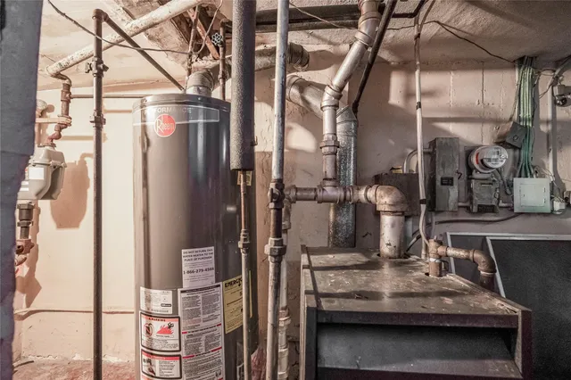 a kitchen with a refrigerator and a sink
