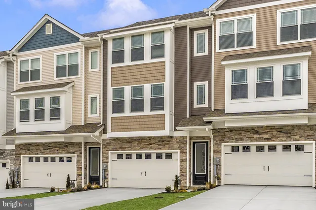 a view of building with a entrance and a house