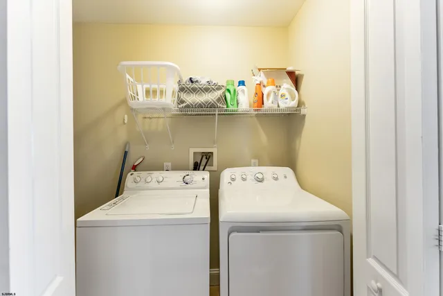 a kitchen with stainless steel appliances granite countertop a refrigerator sink and cabinets