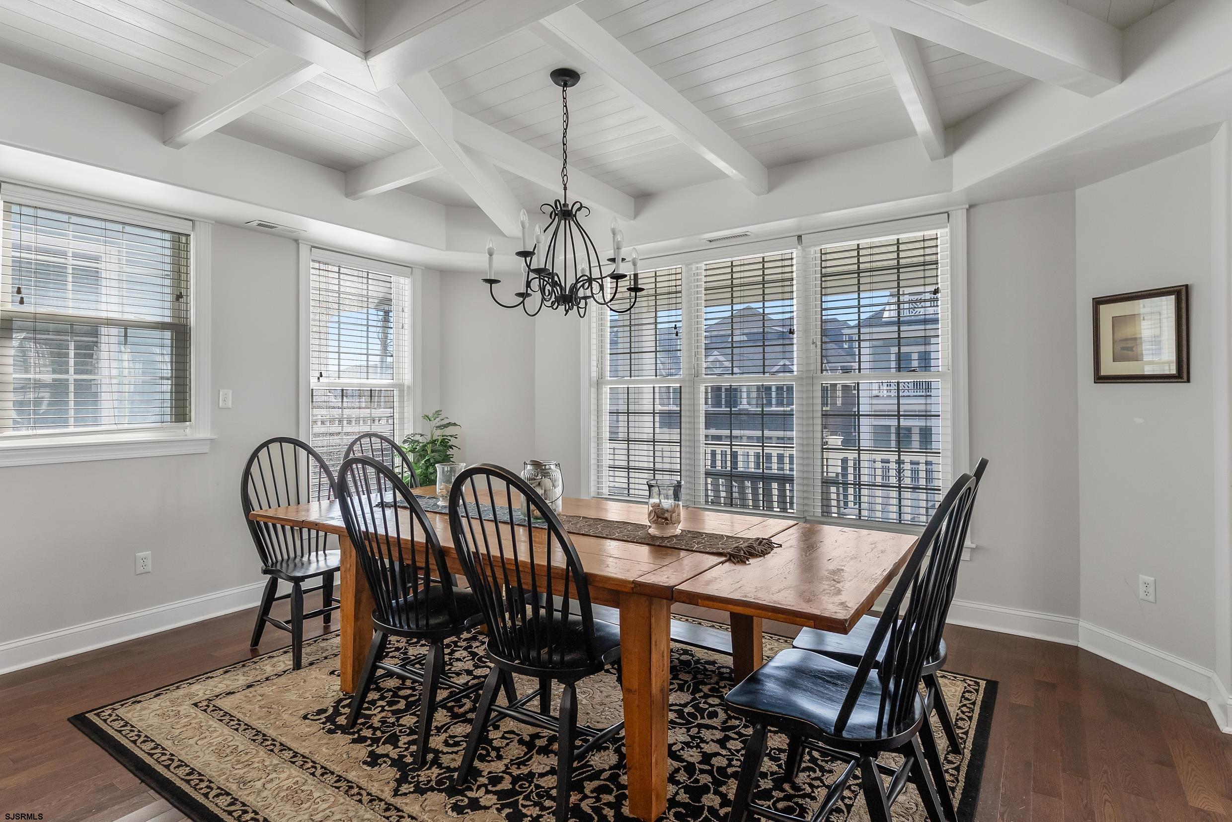 909 East 4th Street Ocean City, NJ 08226 - Photo 41 of 83 a view of a dining room with furniture window and wooden floor