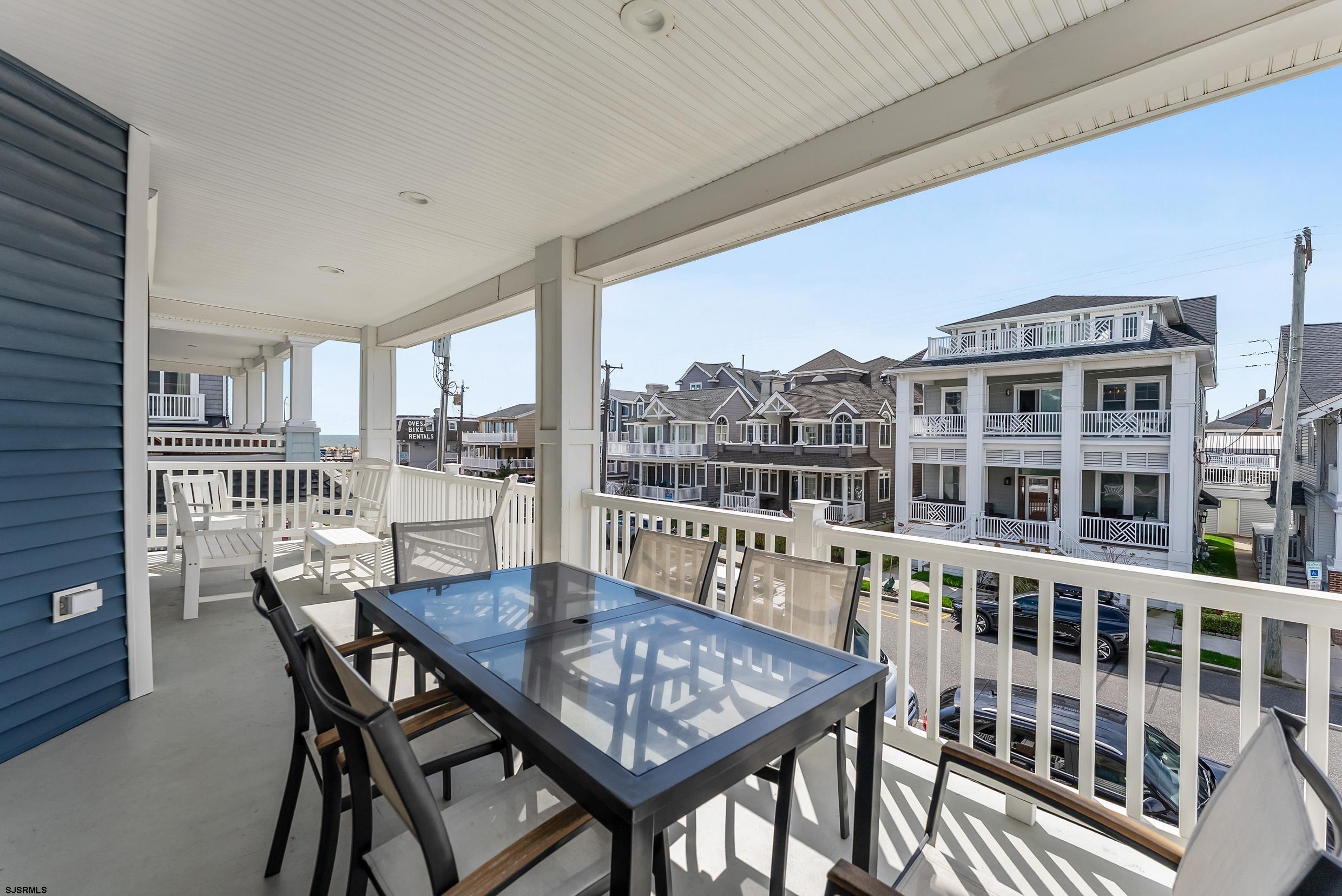 909 East 4th Street Ocean City, NJ 08226 - Photo 46 of 83 a view of a dining room with furniture window and wooden floor