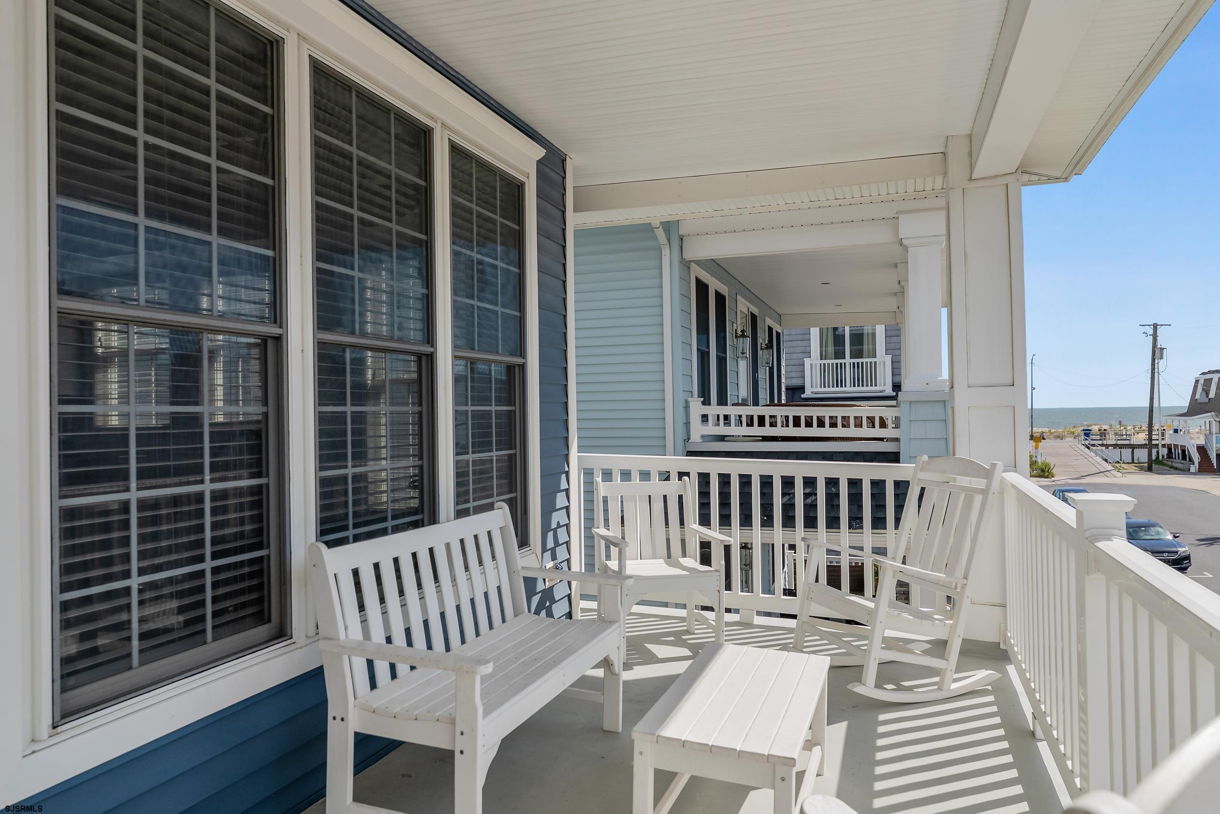909 East 4th Street Ocean City, NJ 08226 - Photo 48 of 83 a view of a chair and table on the deck