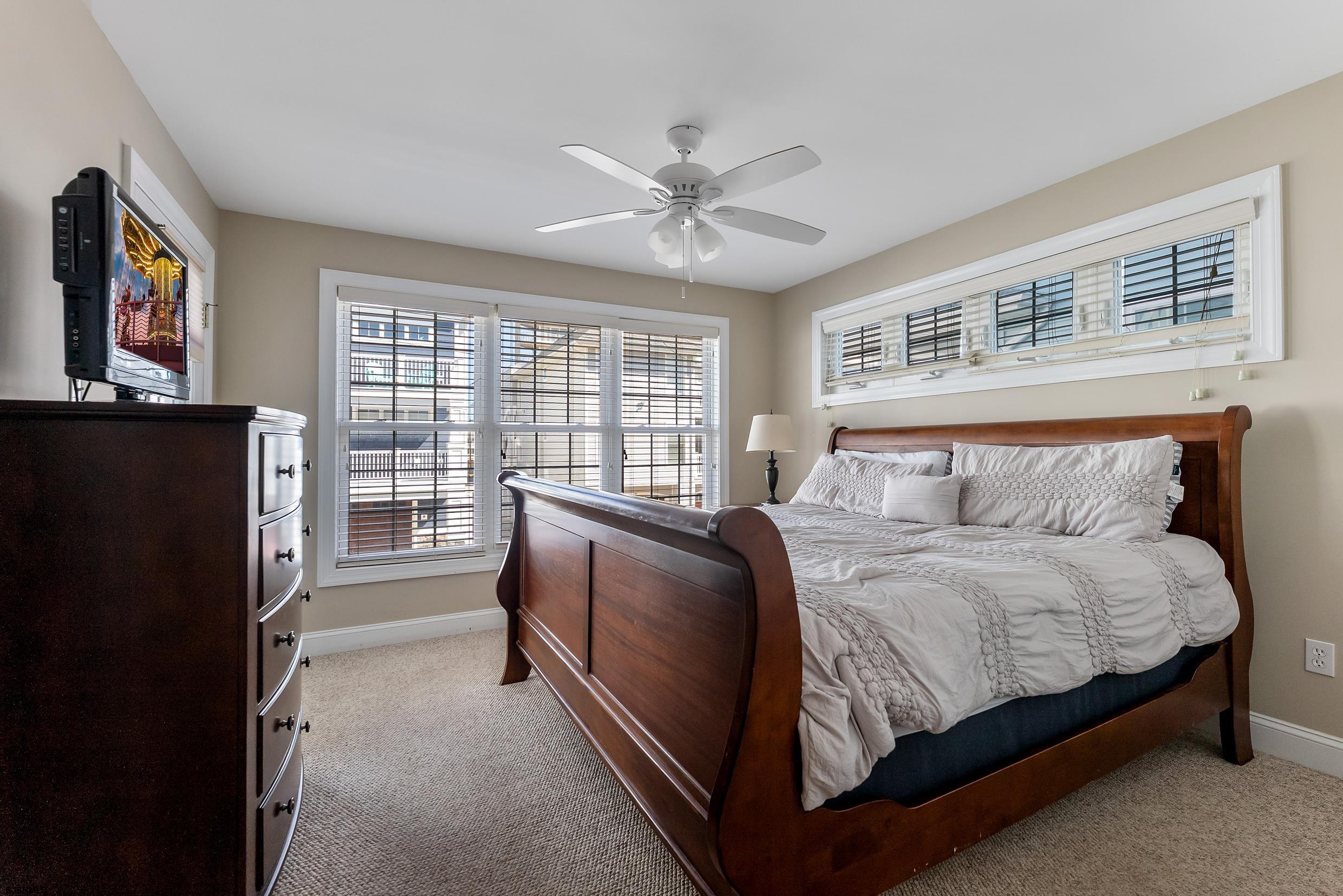 909 East 4th Street Ocean City, NJ 08226 - Photo 7 of 83 a bedroom with a bed and a window