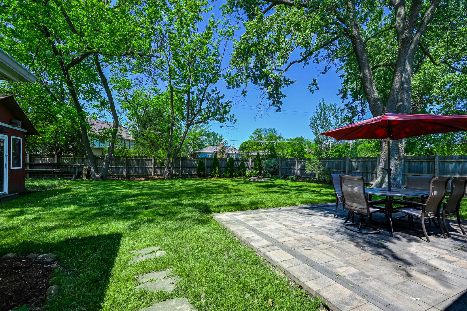 330 Village Road Willowbrook, IL 60527 - Photo 17 of 19 a view of backyard with seating and green space