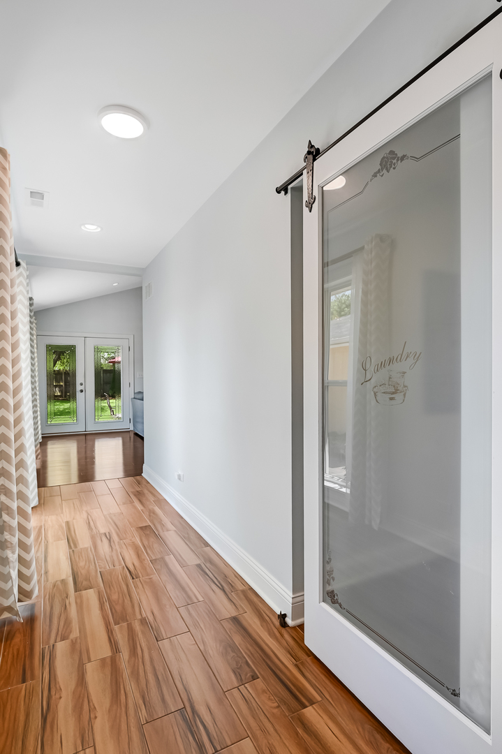 330 Village Road Willowbrook, IL 60527 - Photo 7 of 19 a bathroom with a shower and a window