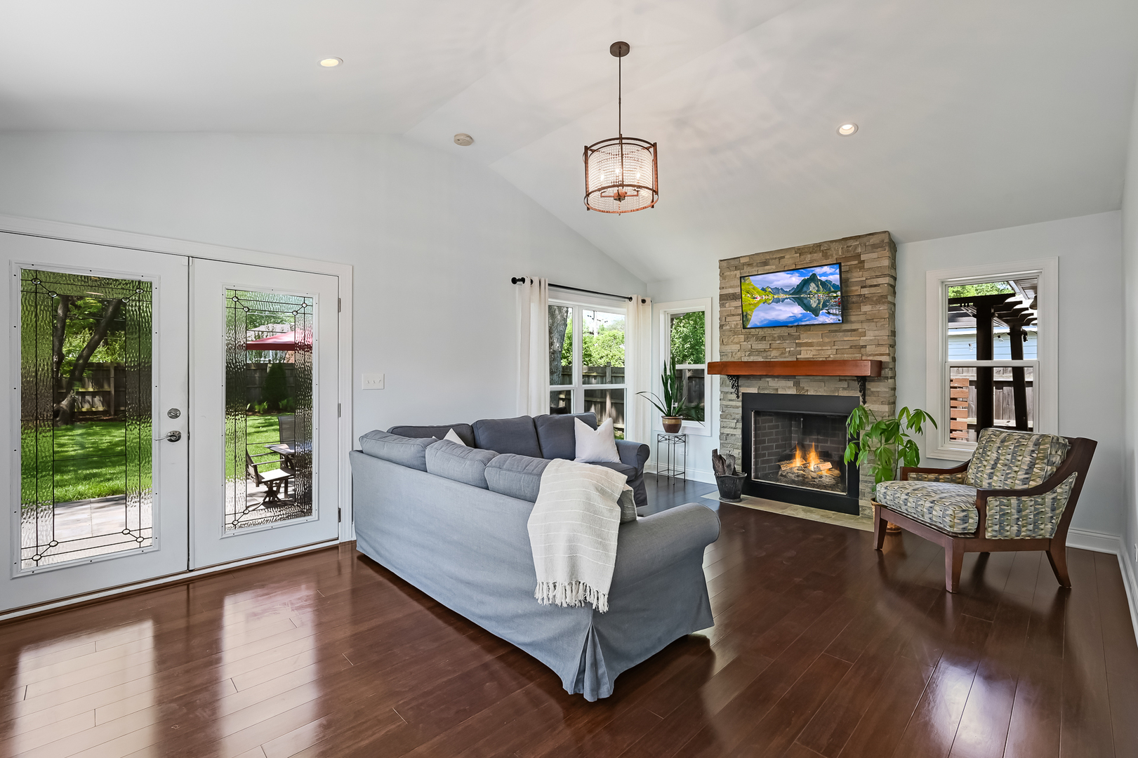 330 Village Road Willowbrook, IL 60527 - Photo 9 of 19 a living room with furniture and a fireplace