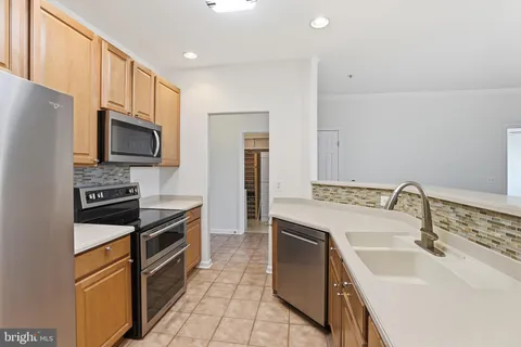 $399,000 | 2610 Chapel Lake Drive, Unit 408, Gambrills, MD 21054