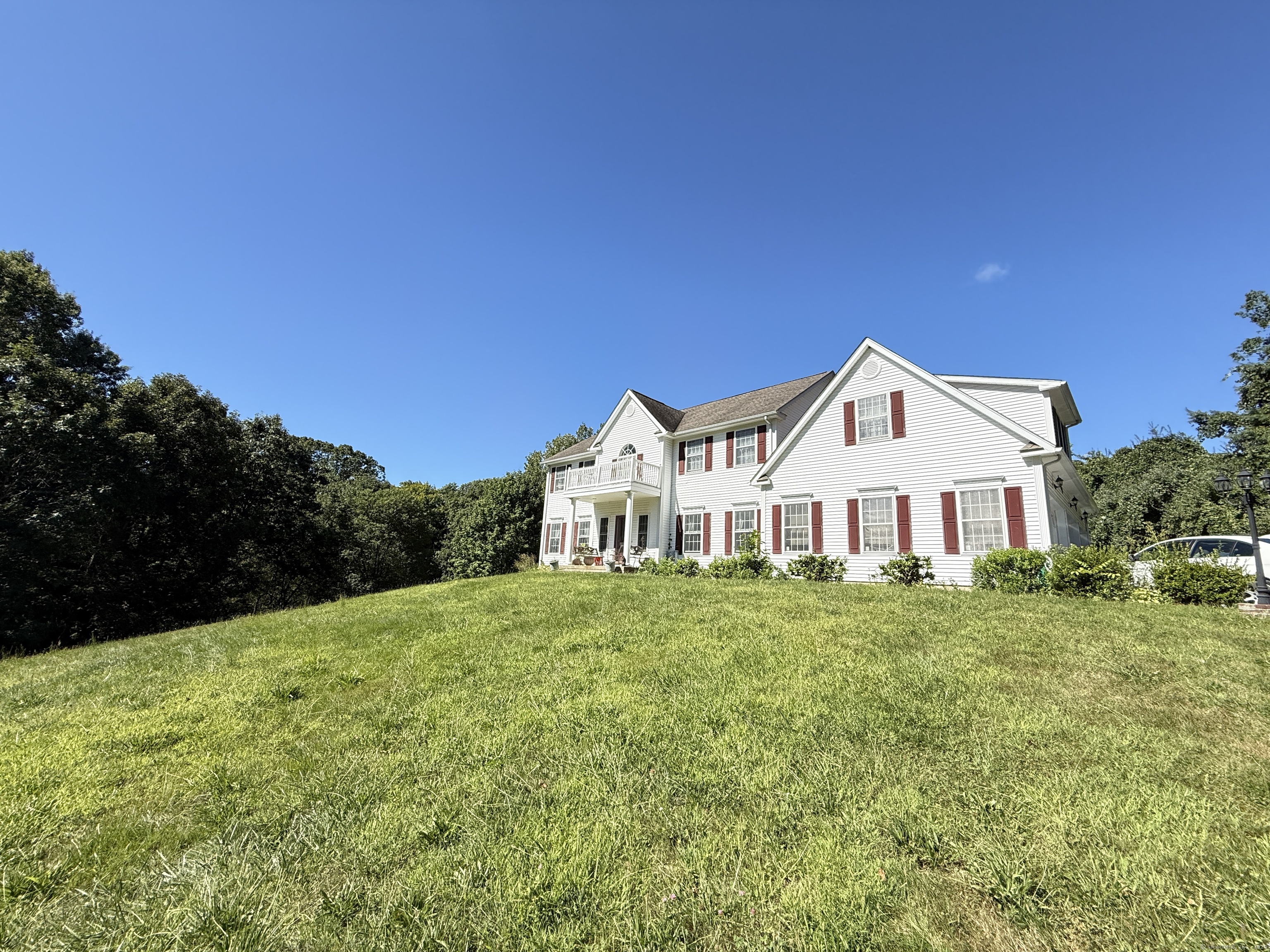 143 Bound Line Road Wolcott, CT 06716 - Photo 2 of 12 a view of a house with a yard and plants
