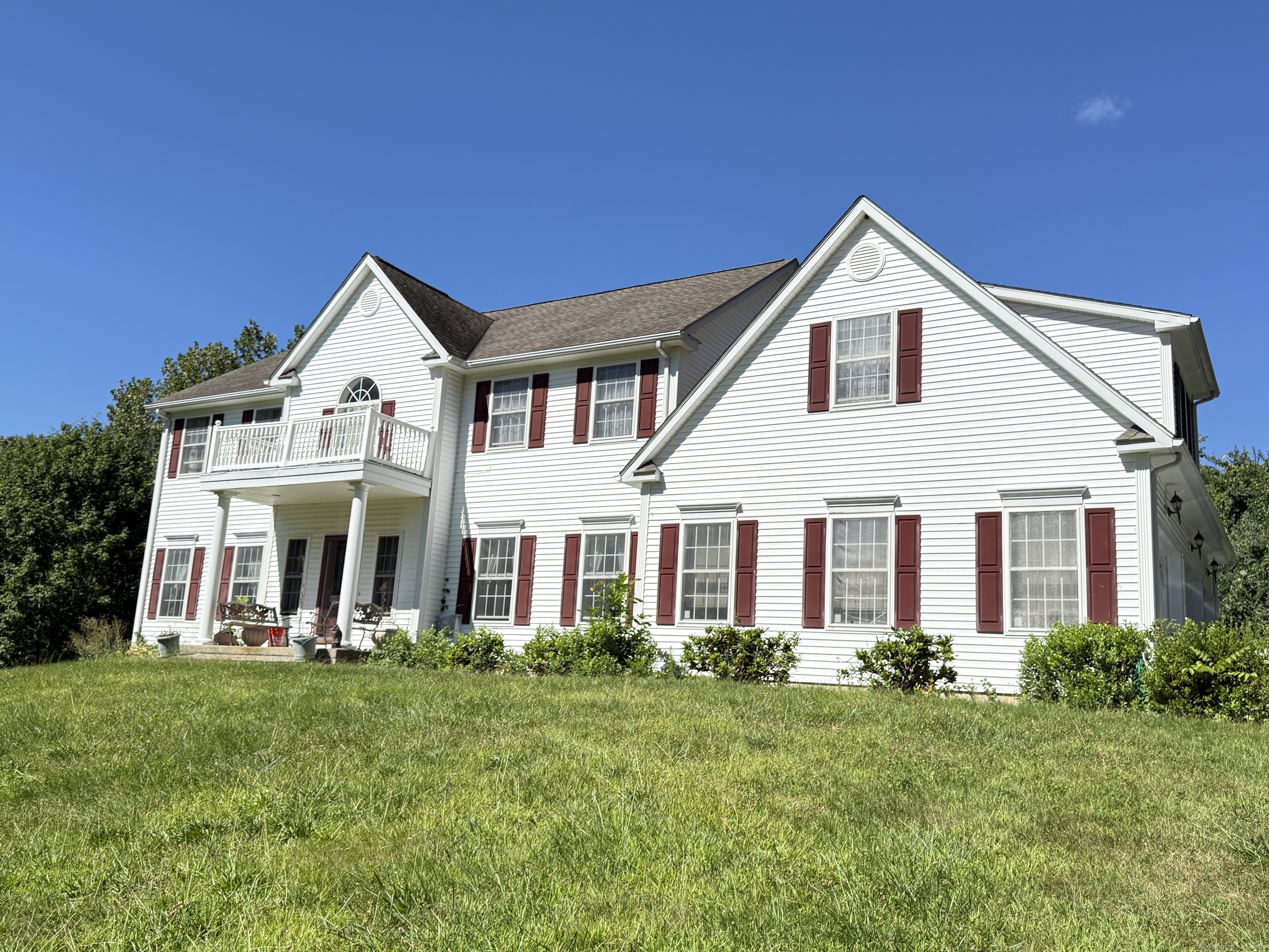 143 Bound Line Road Wolcott, CT 06716 - Photo 5 of 12 a front view of a house with a yard