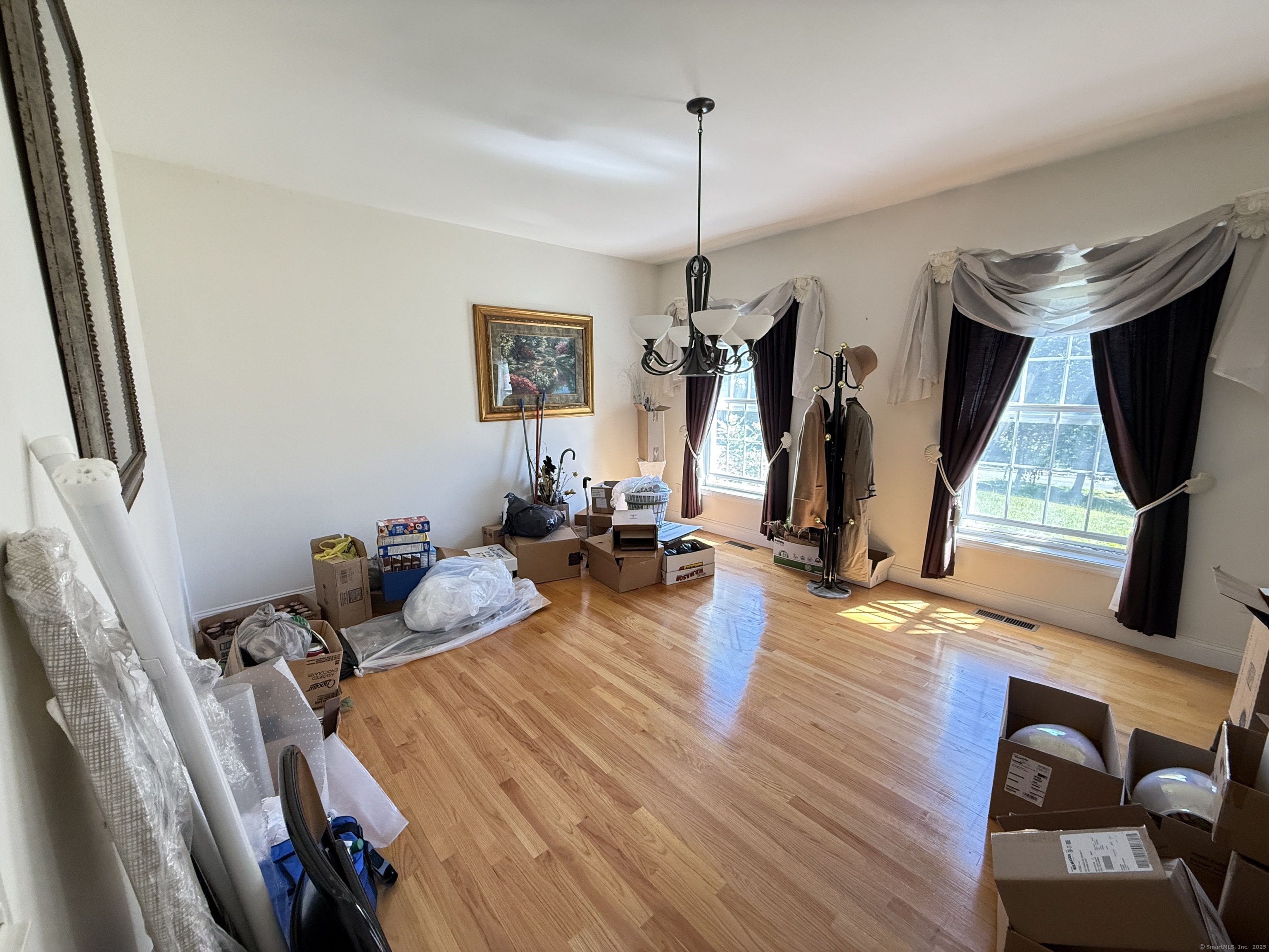 143 Bound Line Road Wolcott, CT 06716 - Photo 9 of 12 a view of a dining room with furniture window and wooden floor