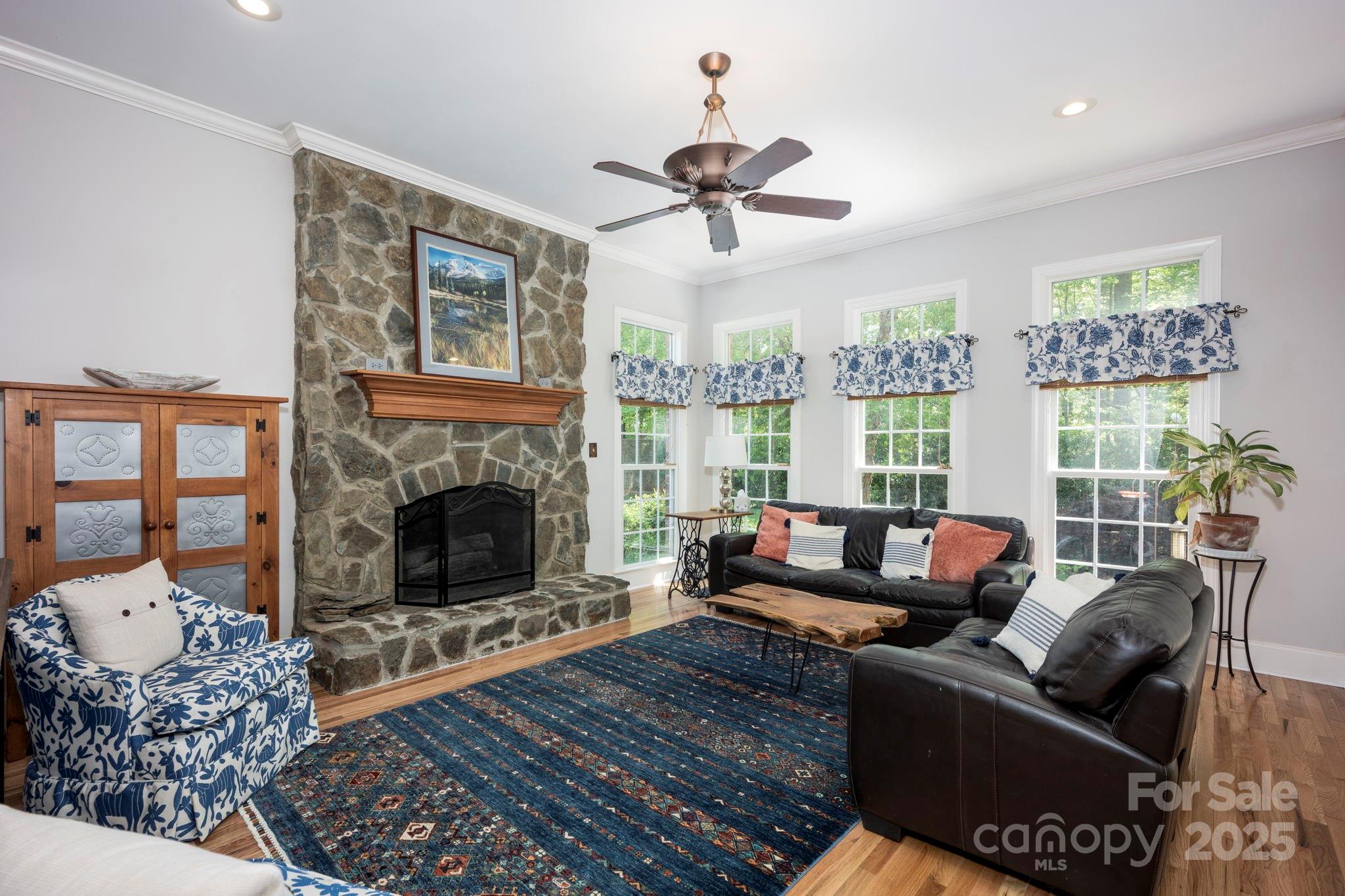 3622 Roxburgh Lane Gastonia, NC 28056 - Photo 17 of 47 a living room with furniture and a fireplace