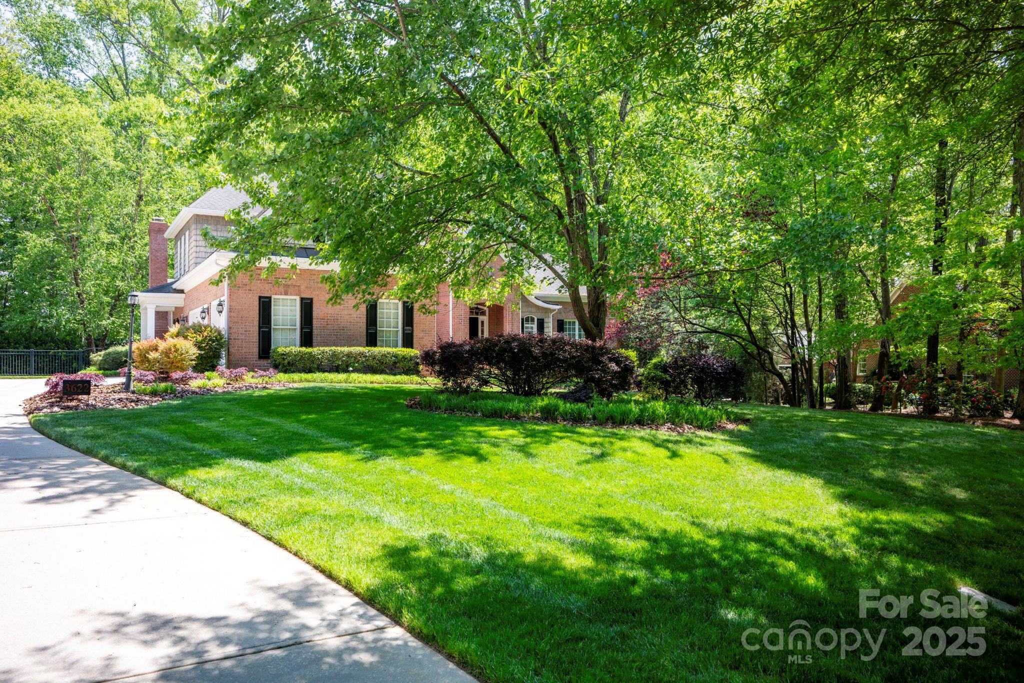 3622 Roxburgh Lane Gastonia, NC 28056 - Photo 2 of 47 a view of a house with backyard sitting area and garden
