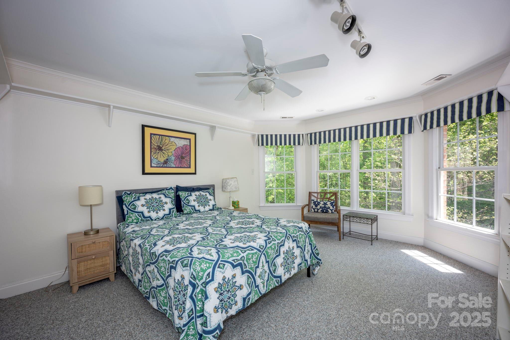 3622 Roxburgh Lane Gastonia, NC 28056 - Photo 29 of 47 a bed sitting in a spacious bedroom next to a window