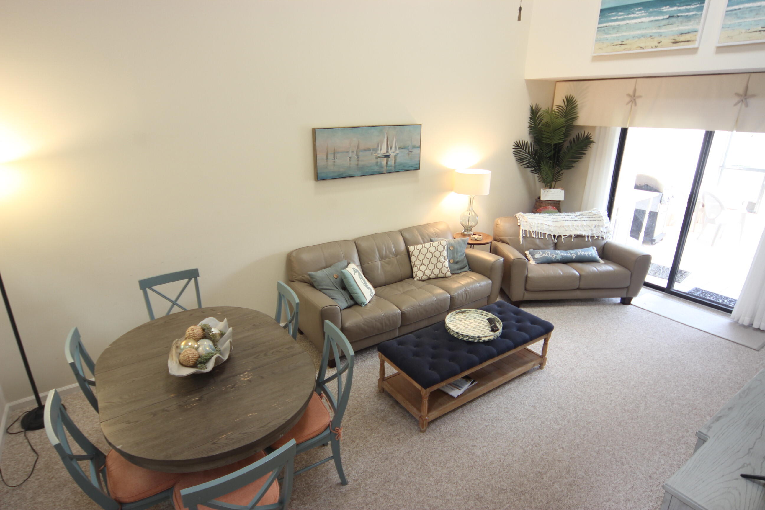 508 Sea Oats Drive, Unit B4 Juno Beach, FL 33408 - Photo 5 of 26 a living room with furniture and a table