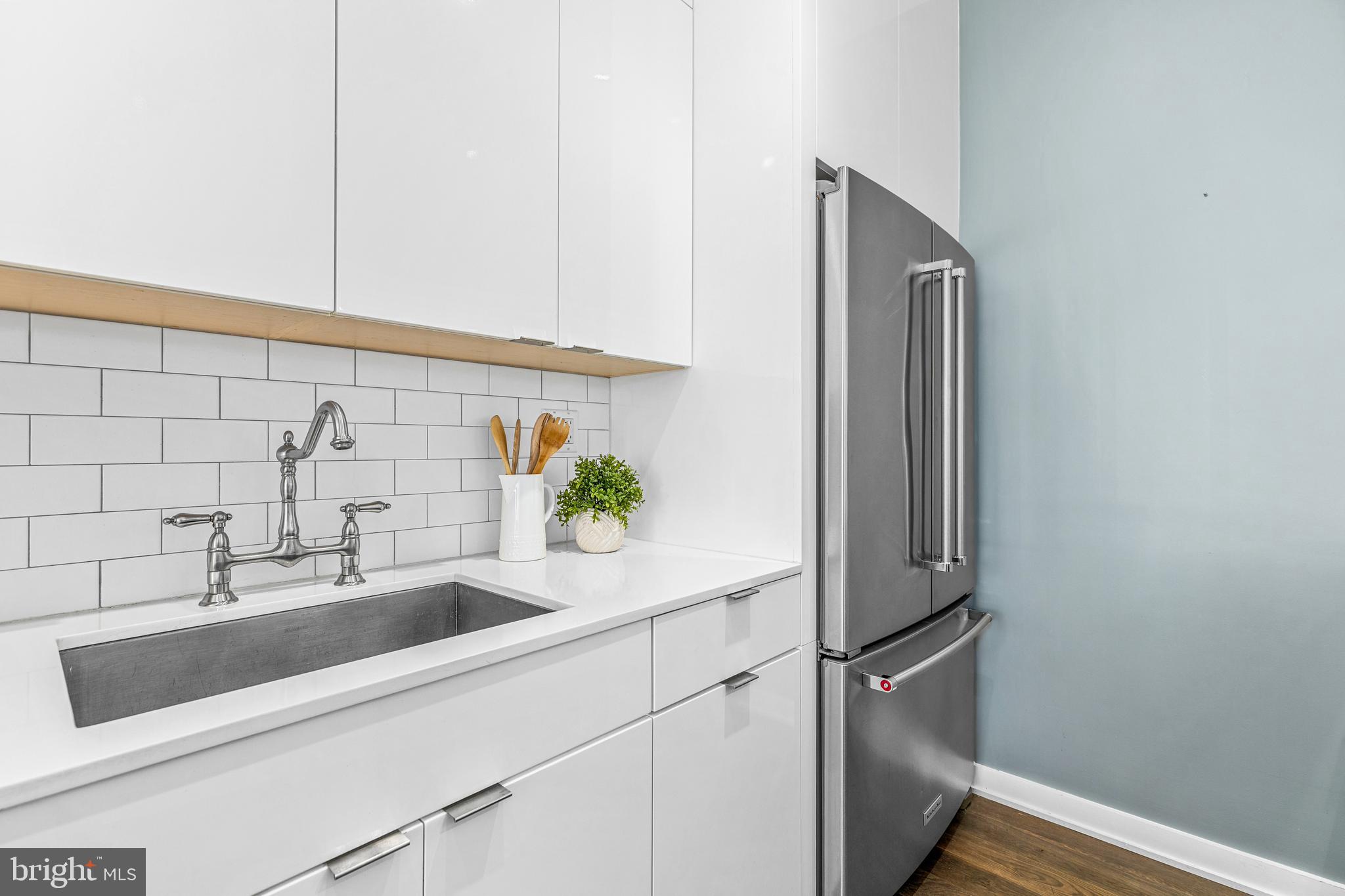1380 Quincy Street Northwest, Unit 3E Washington, DC 20010 - Photo 11 of 40 a bathroom with a sink and vanity