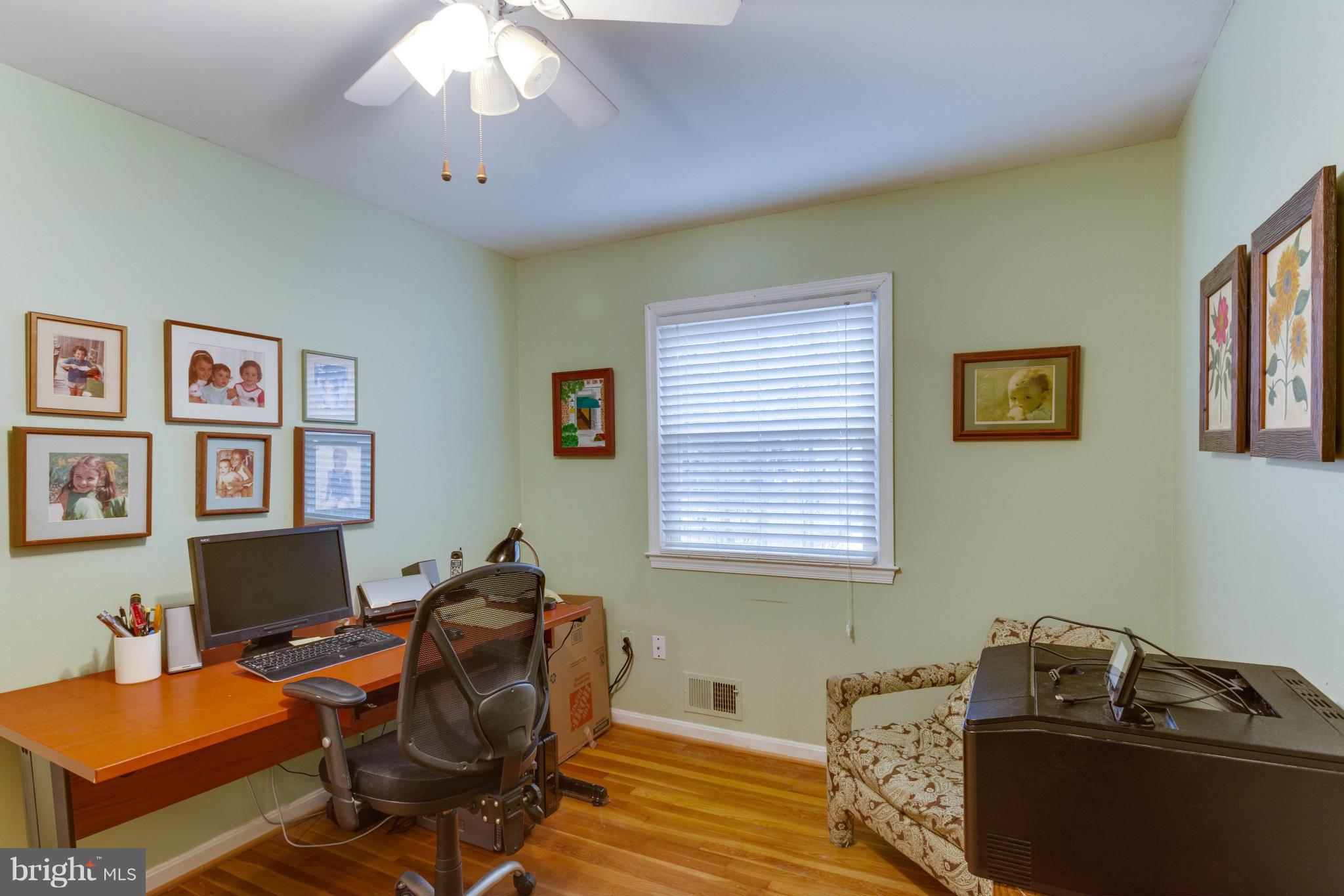 9810 Vale Road Vienna, VA 22181 - Photo 13 of 30 a room with furniture and a window