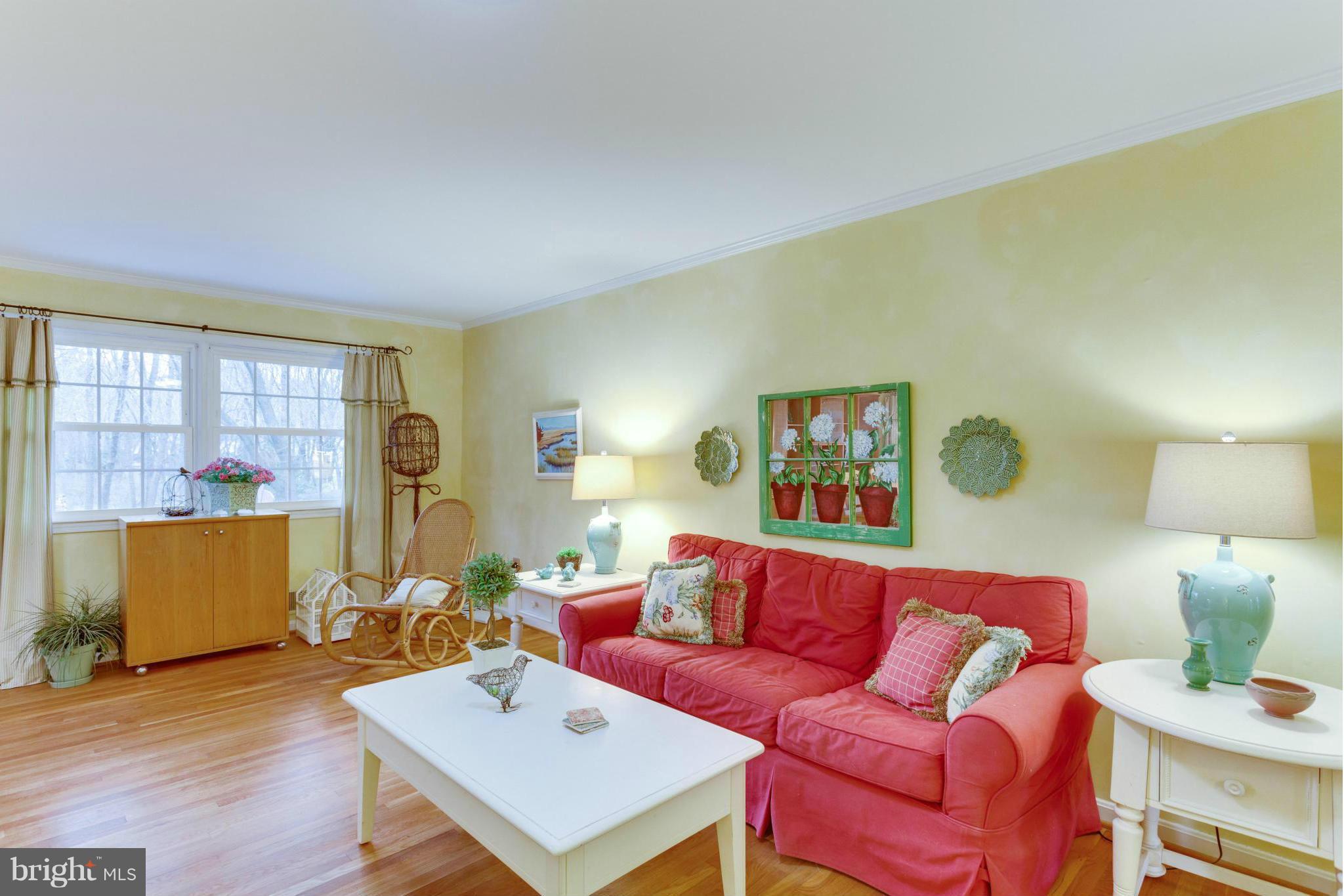 9810 Vale Road Vienna, VA 22181 - Photo 7 of 30 a living room with furniture and a window