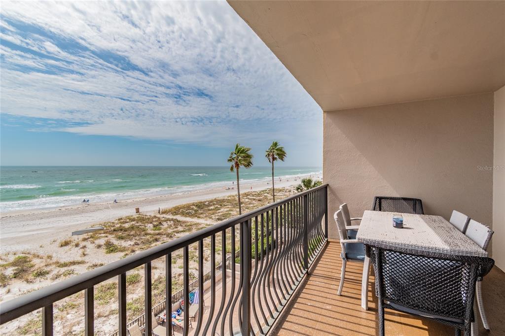13650 Gulf Boulevard, Unit 402 Madeira Beach, FL 33708 - Photo 29 of 44 a view of a balcony with an outdoor space