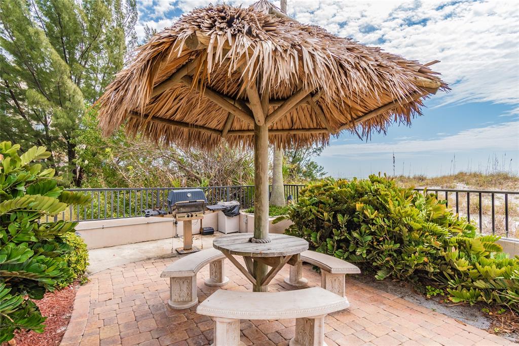 13650 Gulf Boulevard, Unit 402 Madeira Beach, FL 33708 - Photo 37 of 44 a view of yard with patio